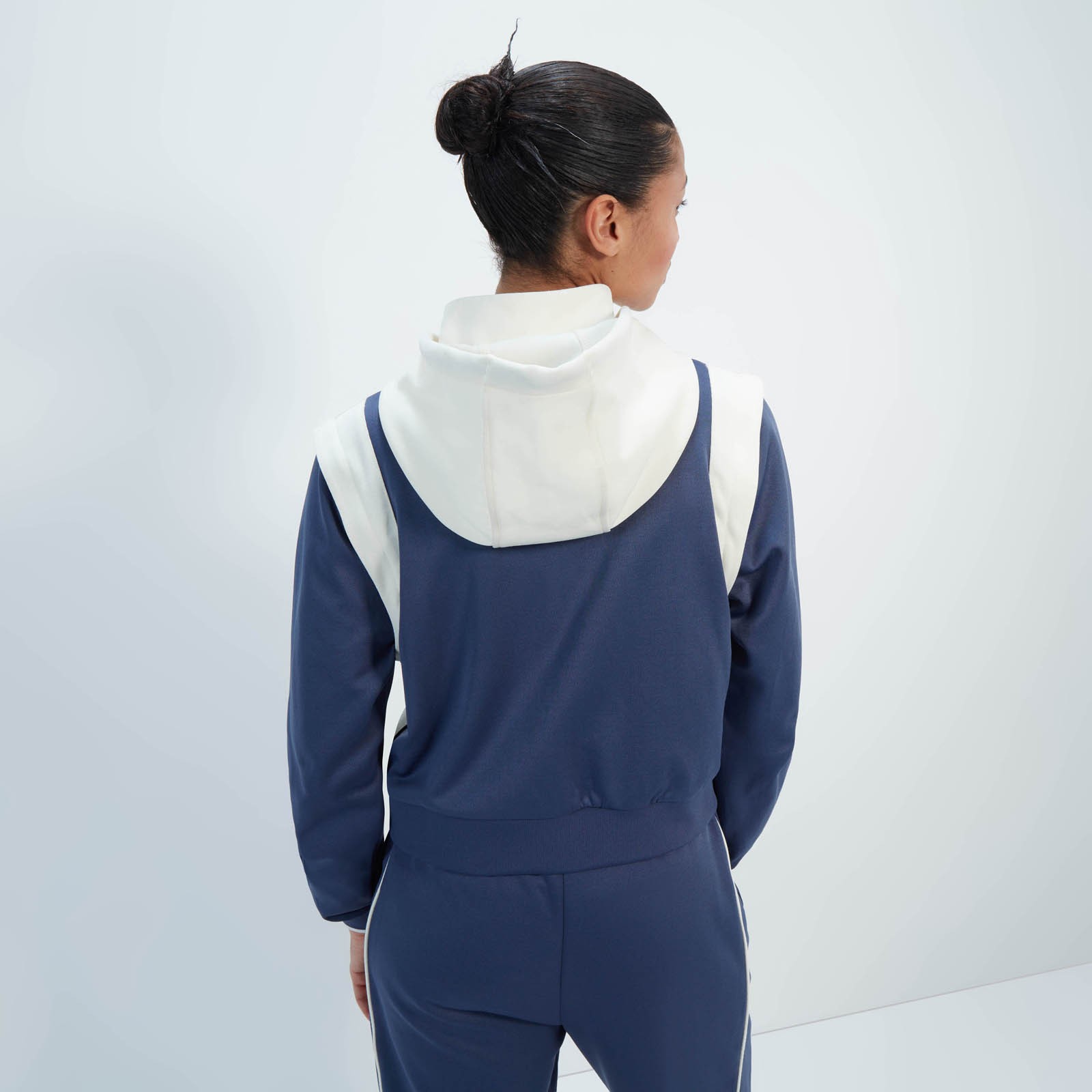 Casaco deportiva crop Perna