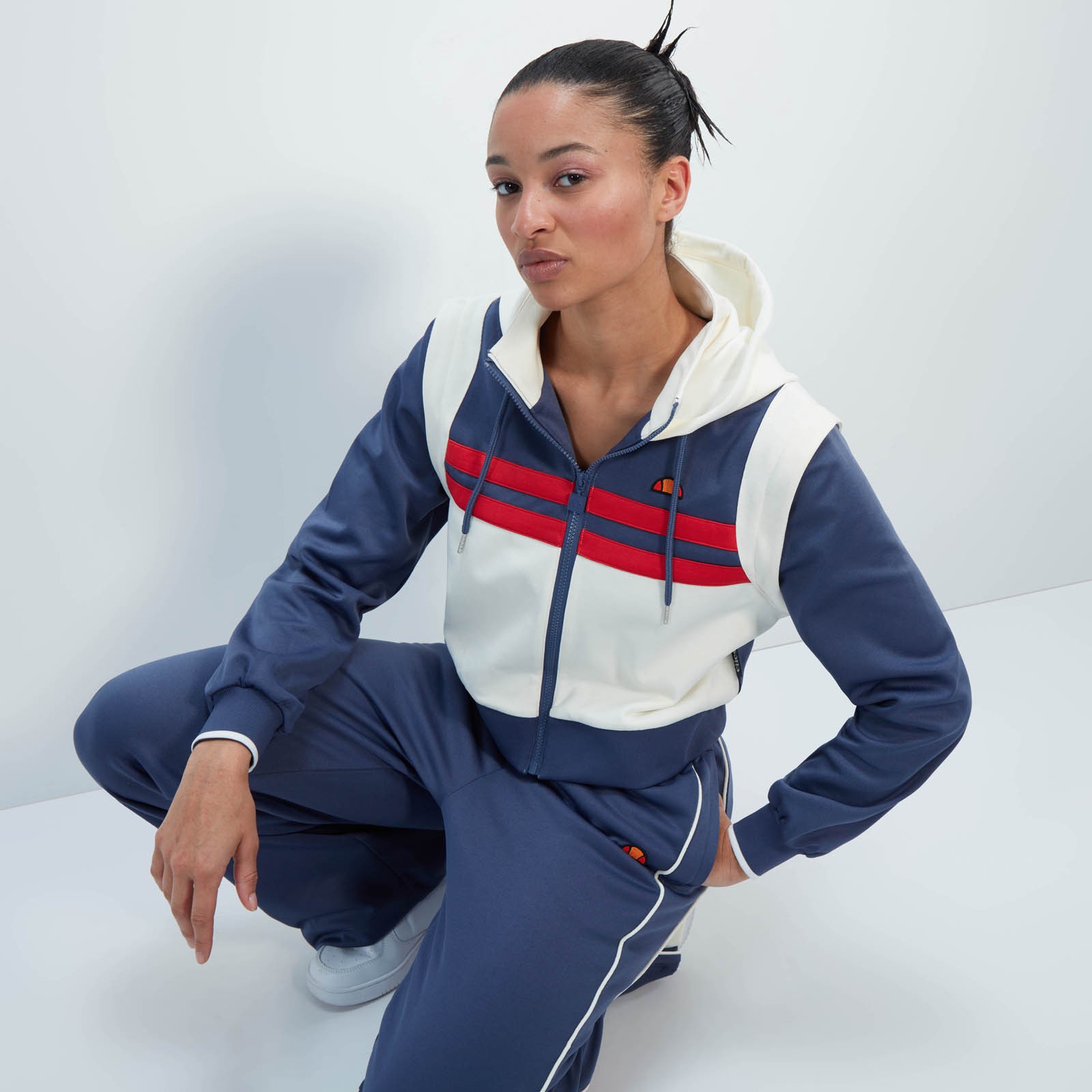Casaco deportiva crop Perna