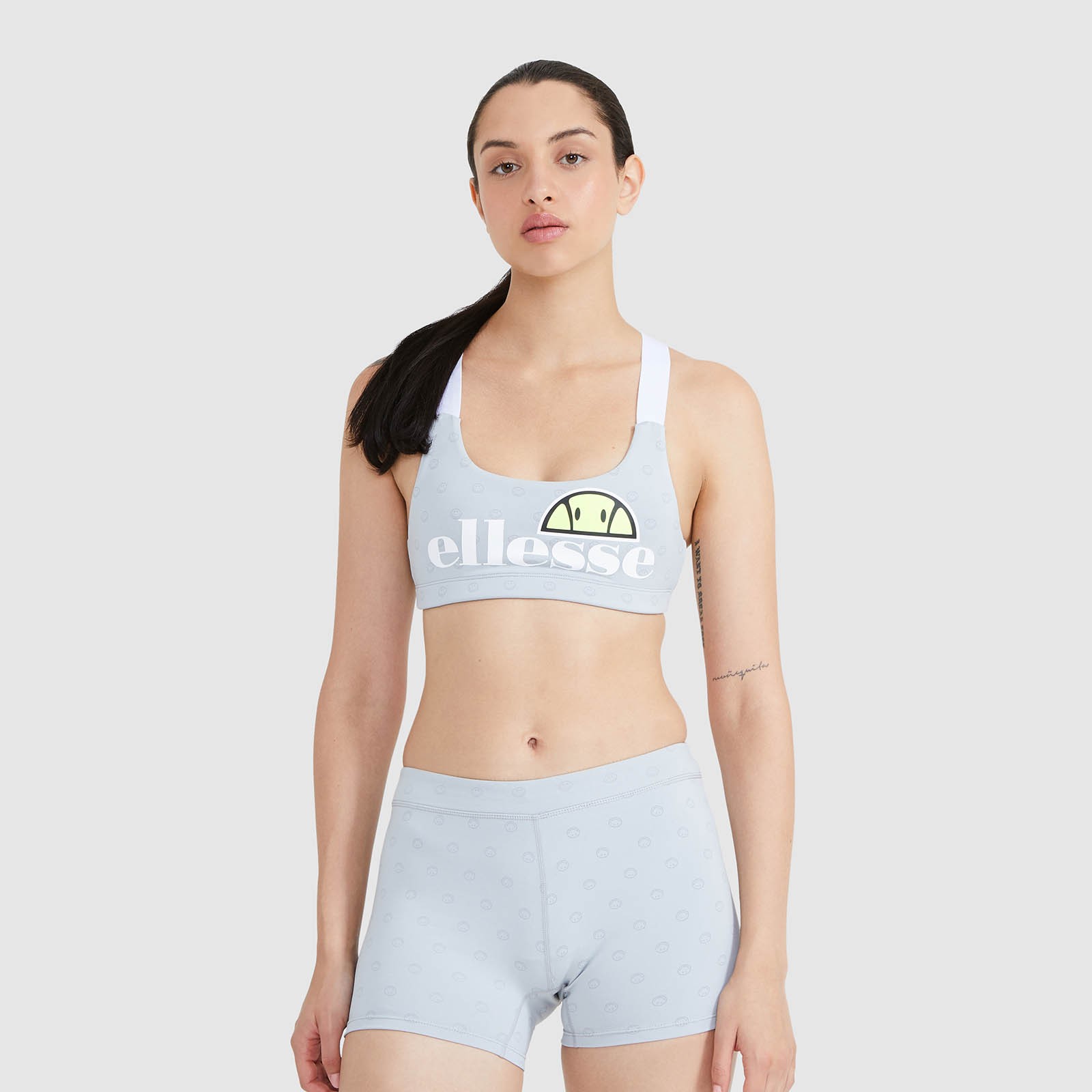 Smiley x ellesse. Sujetador deportivo Cristo